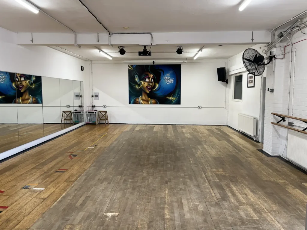 Dance studio 2 at Hype Dance in Sheffield, with a wall of mirrors, a mural on the end wall and ballet barres